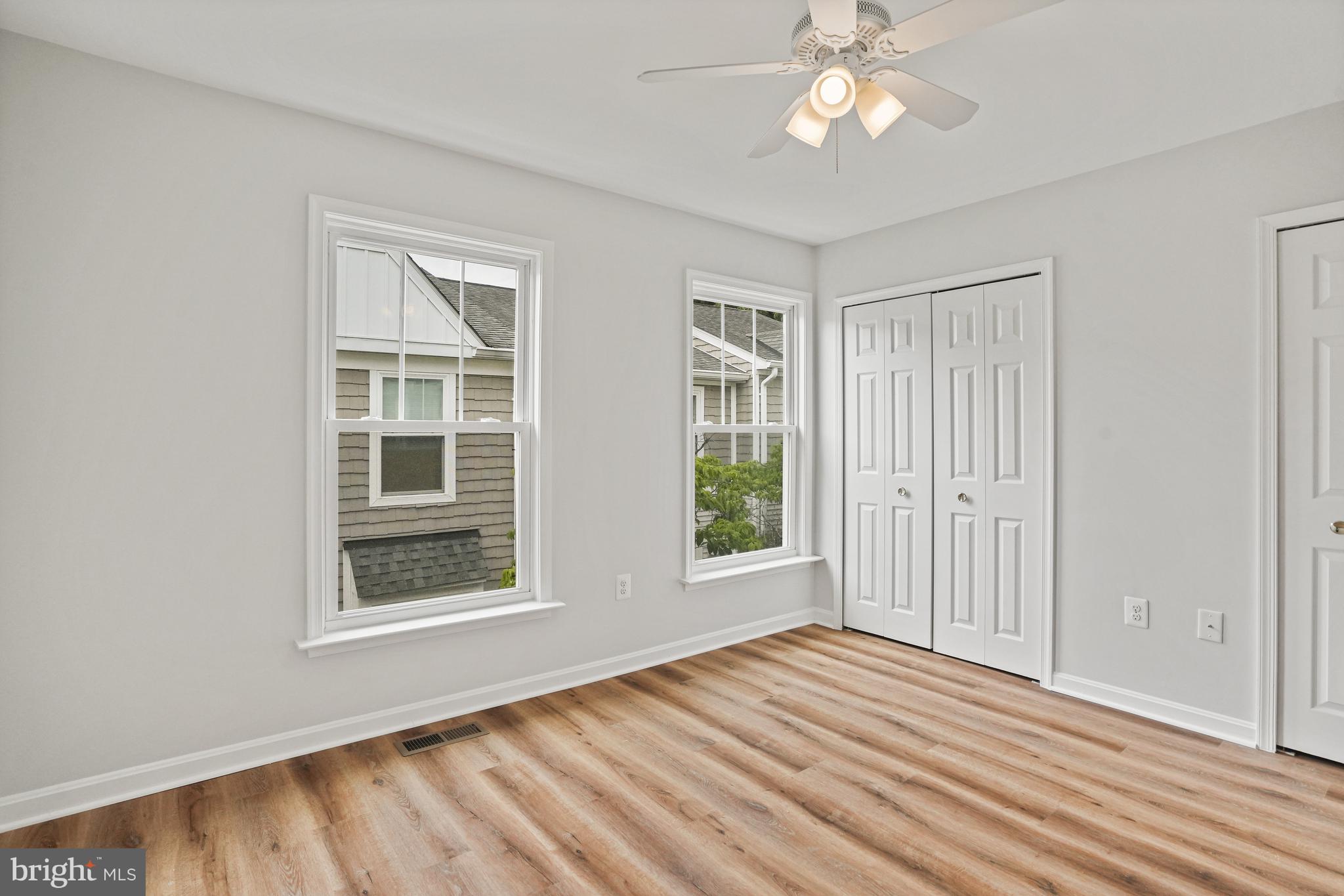 3823 9th Road South Arlington, VA 22204 - Photo 19 of 40 a view of an empty room with a window and wooden floor