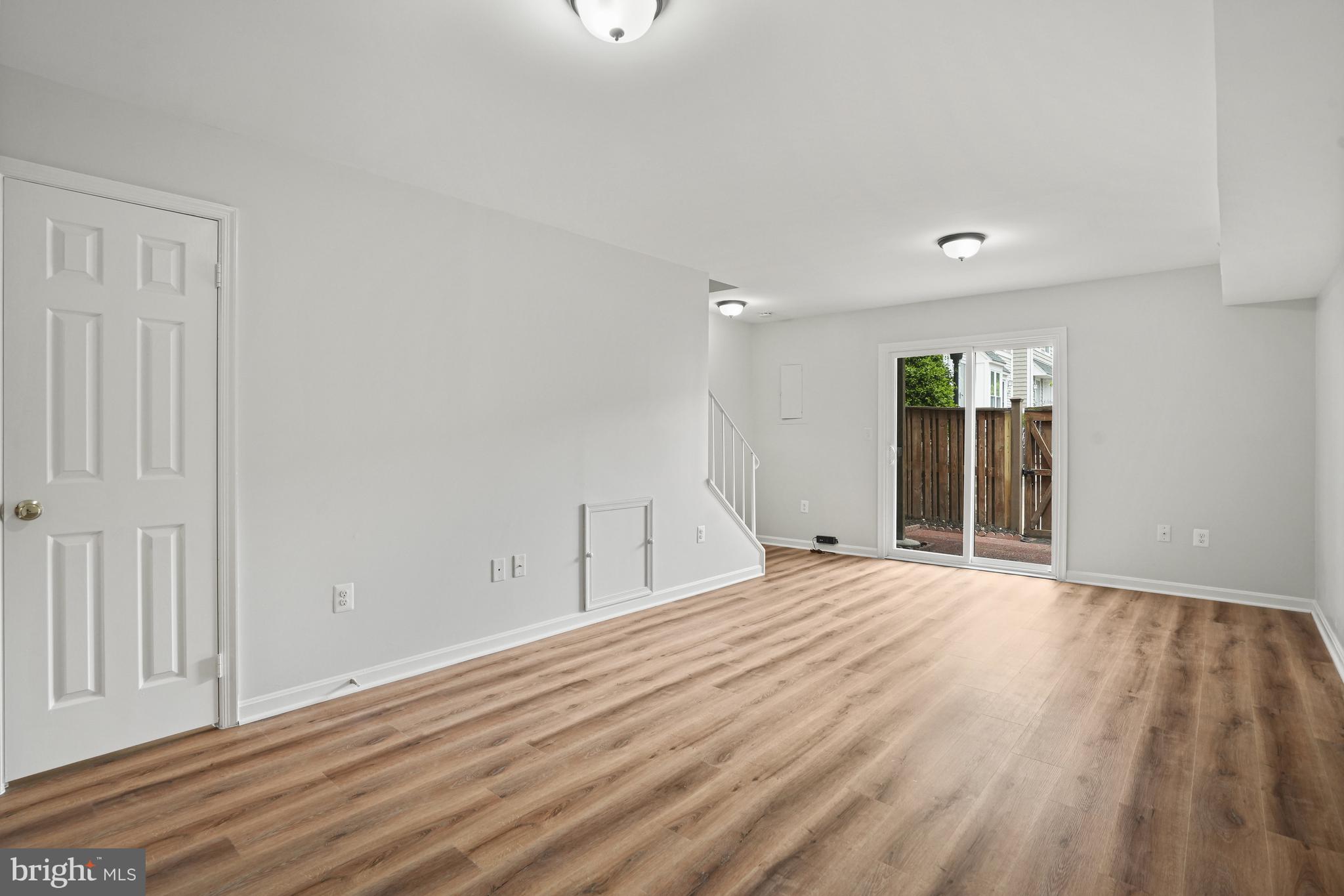 3823 9th Road South Arlington, VA 22204 - Photo 25 of 40 a view of an empty room with wooden floor
