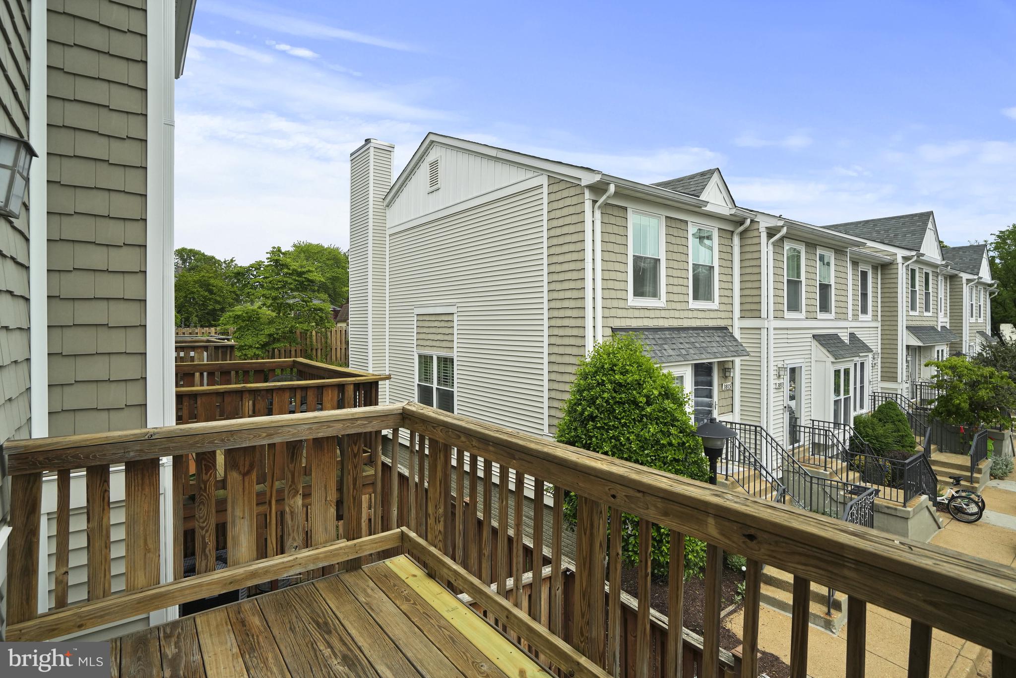 3823 9th Road South Arlington, VA 22204 - Photo 29 of 40 a view of a balcony with wooden floor and fence