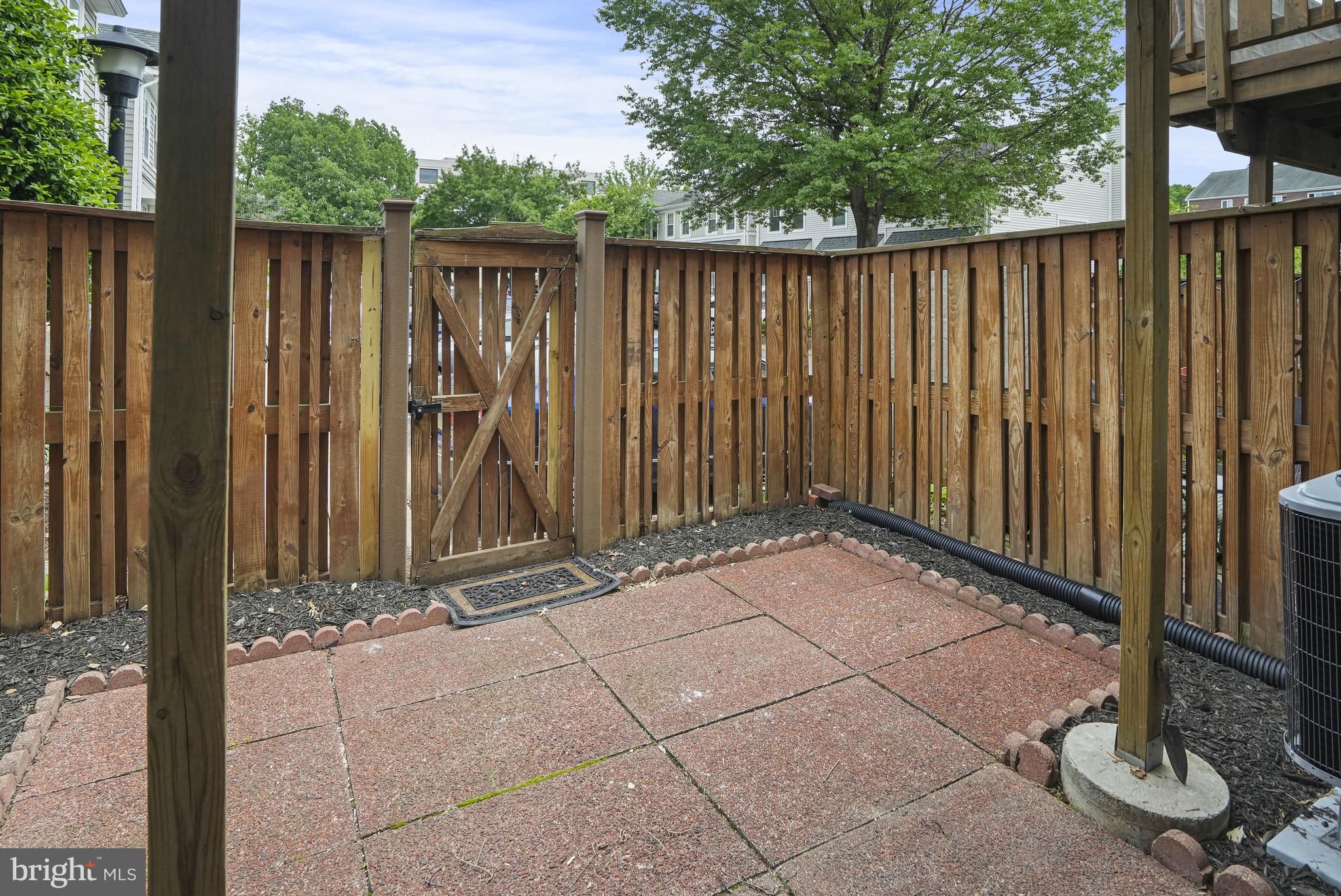 3823 9th Road South Arlington, VA 22204 - Photo 31 of 40 a view of backyard with tub and wooden fence