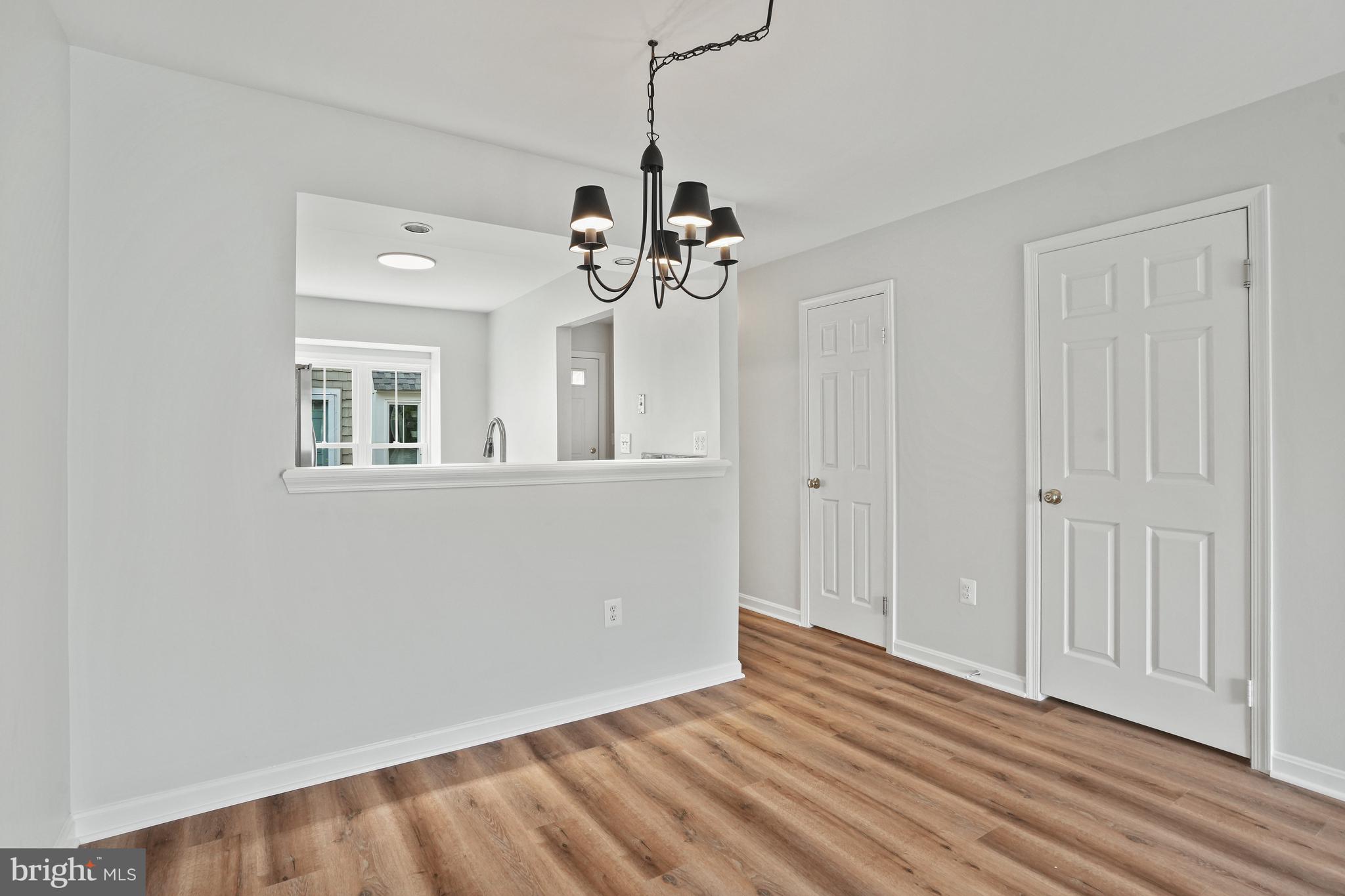 3823 9th Road South Arlington, VA 22204 - Photo 7 of 40 a view of an empty room with a window