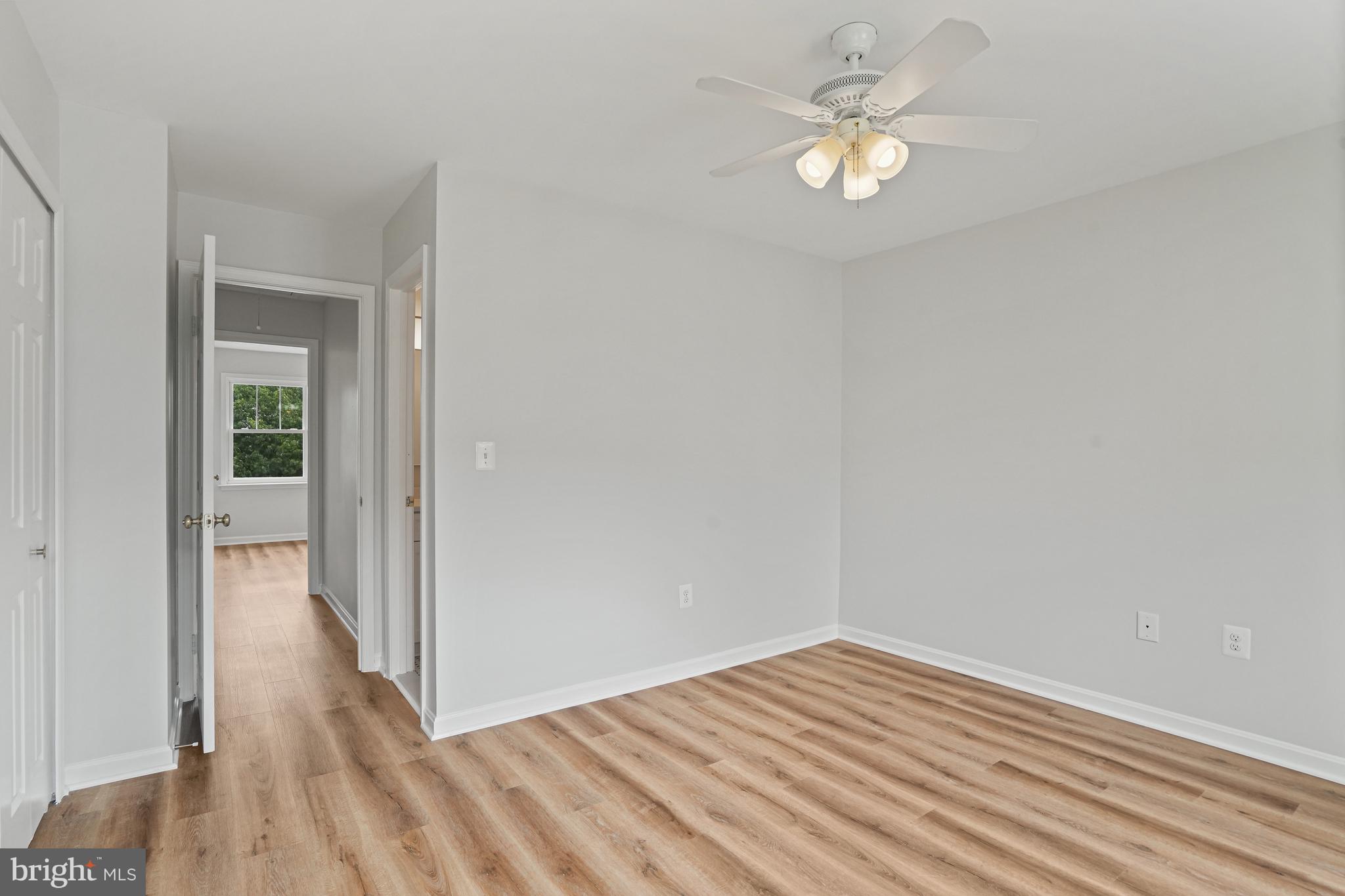 3823 9th Road South Arlington, VA 22204 - Photo 10 of 40 wooden floor in an empty room with a window