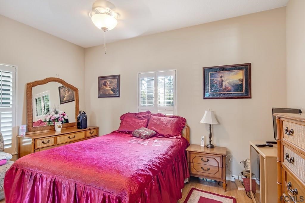 407 Domenico Circle St. Augustine, FL 32086 - Photo 25 of 33 a bed room with a bed and a tv