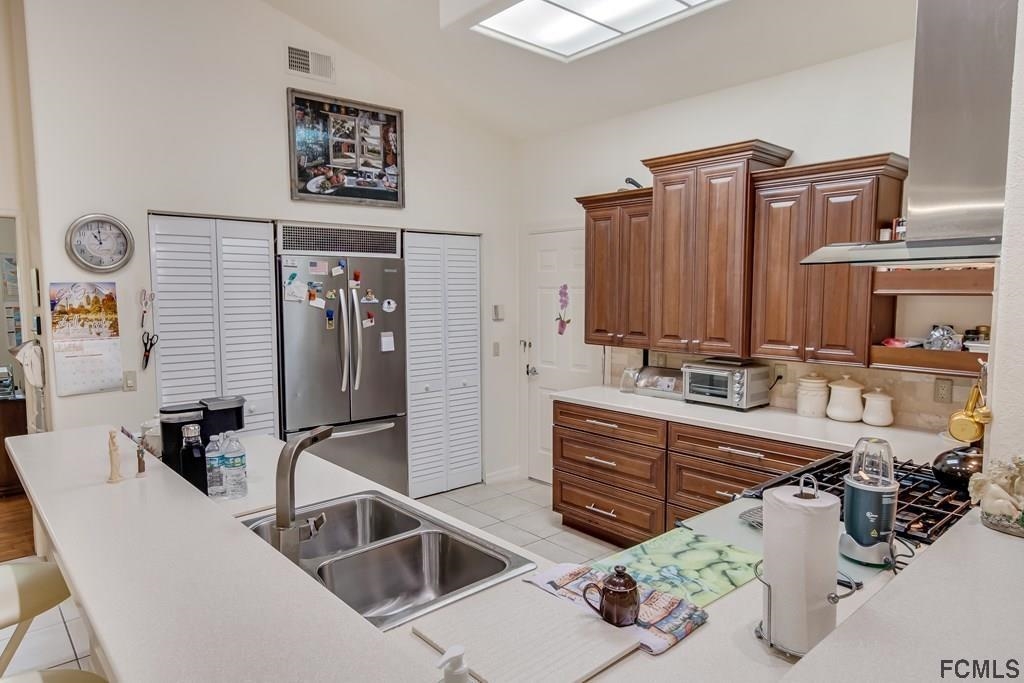 407 Domenico Circle St. Augustine, FL 32086 - Photo 7 of 33 a bathroom with a sink and a mirror