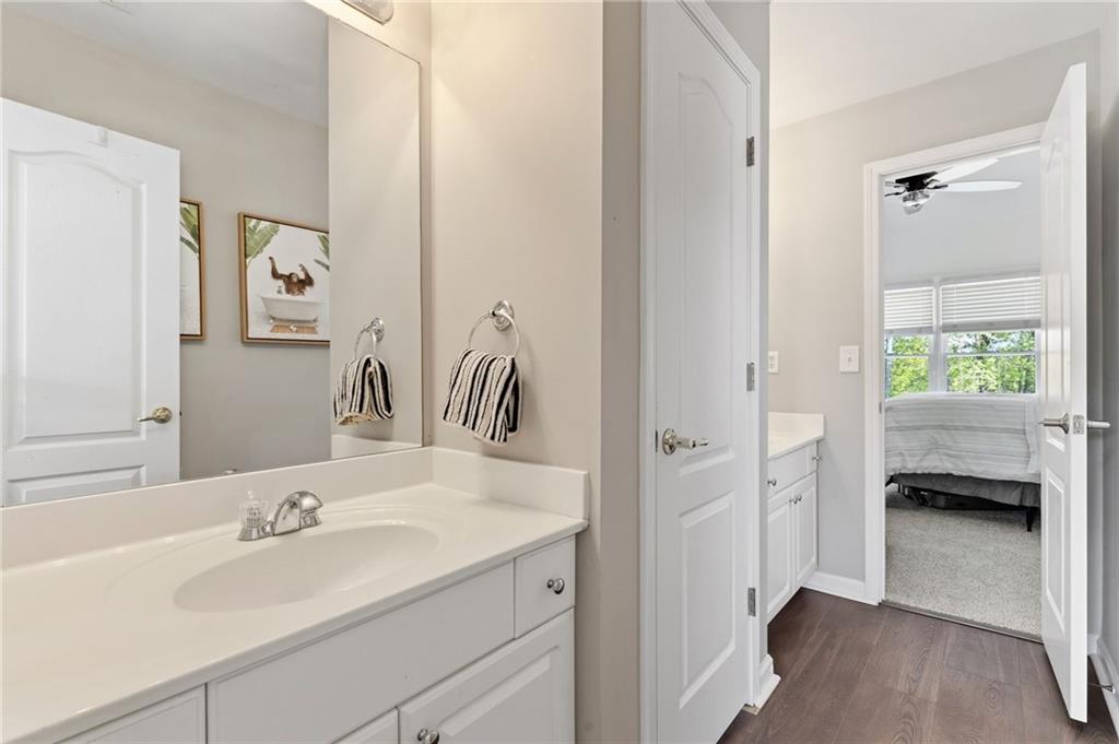 2964 Mill Grove Terrace Dacula, GA 30019 - Photo 39 of 86 a bathroom with a sink and a mirror