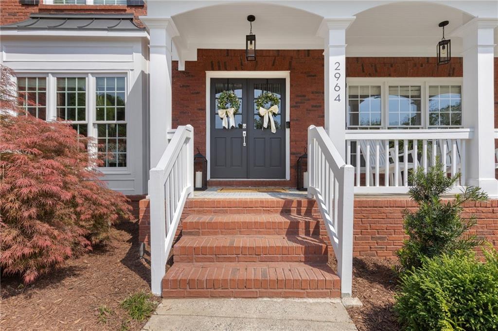 2964 Mill Grove Terrace Dacula, GA 30019 - Photo 5 of 86 front view of a house with a porch