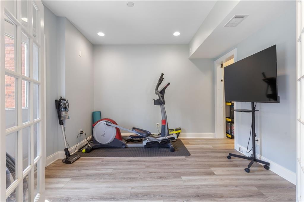 2964 Mill Grove Terrace Dacula, GA 30019 - Photo 52 of 86 a view of a room with gym equipment