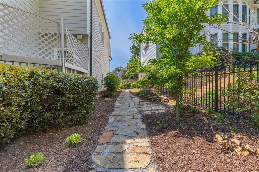 2964 Mill Grove Terrace Dacula, GA 30019 - Photo 61 of 86 a backyard of a house with lots of green space