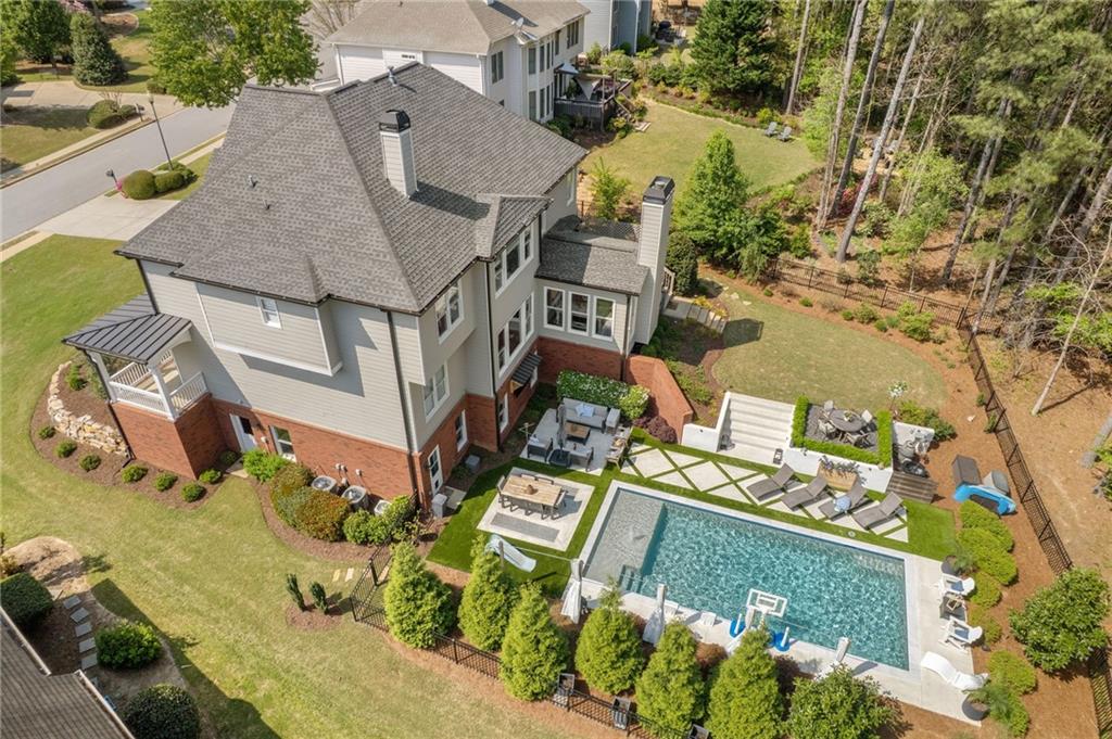 2964 Mill Grove Terrace Dacula, GA 30019 - Photo 66 of 86 an aerial view of multiple houses with yard