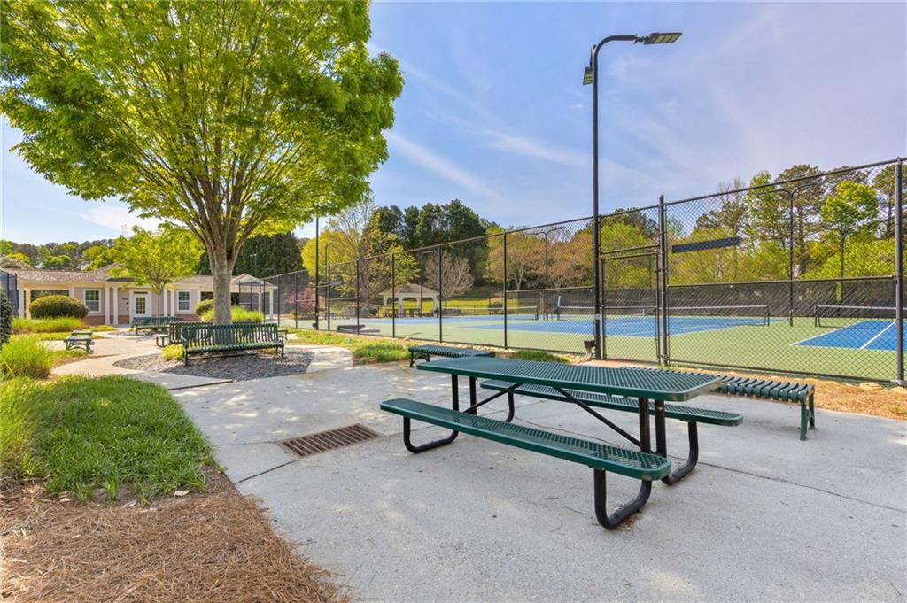 2964 Mill Grove Terrace Dacula, GA 30019 - Photo 75 of 86 a view of a park with sitting area