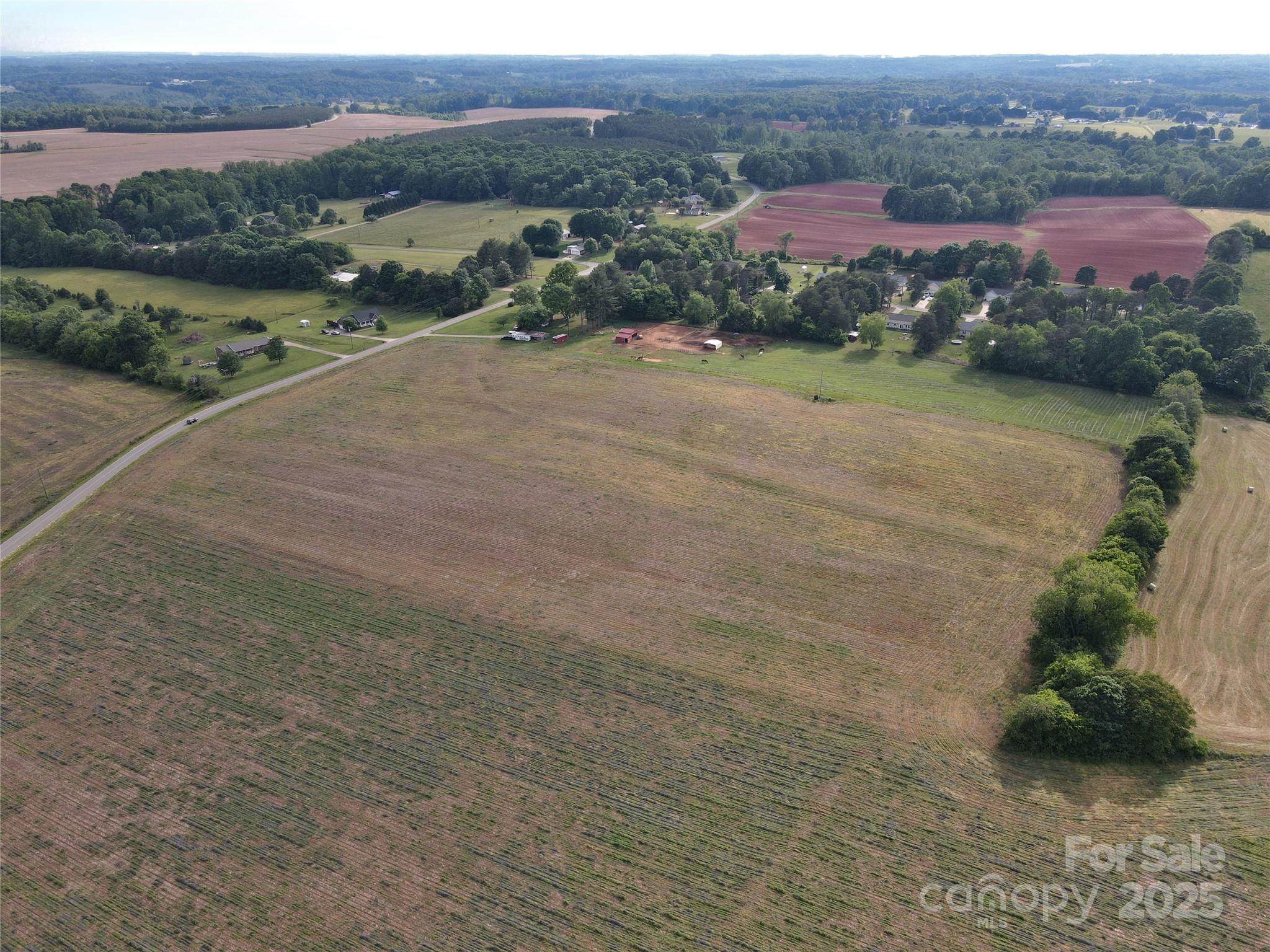 0 Trinity Road Statesville, NC 28625 - Photo 5 of 37 a view of a lake with a city