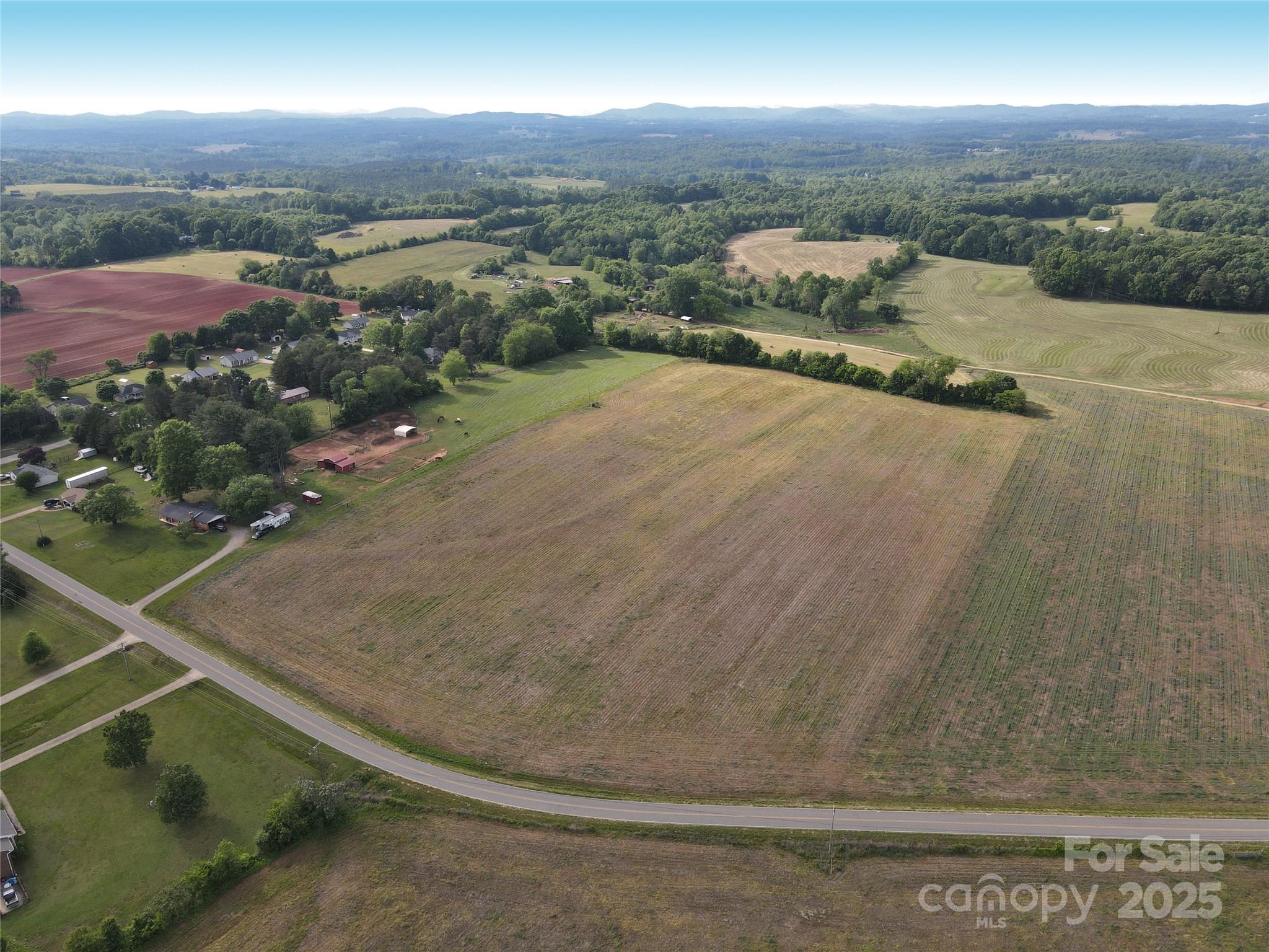 0 Trinity Road Statesville, NC 28625 - Photo 6 of 37 an aerial view of residential houses with outdoor space
