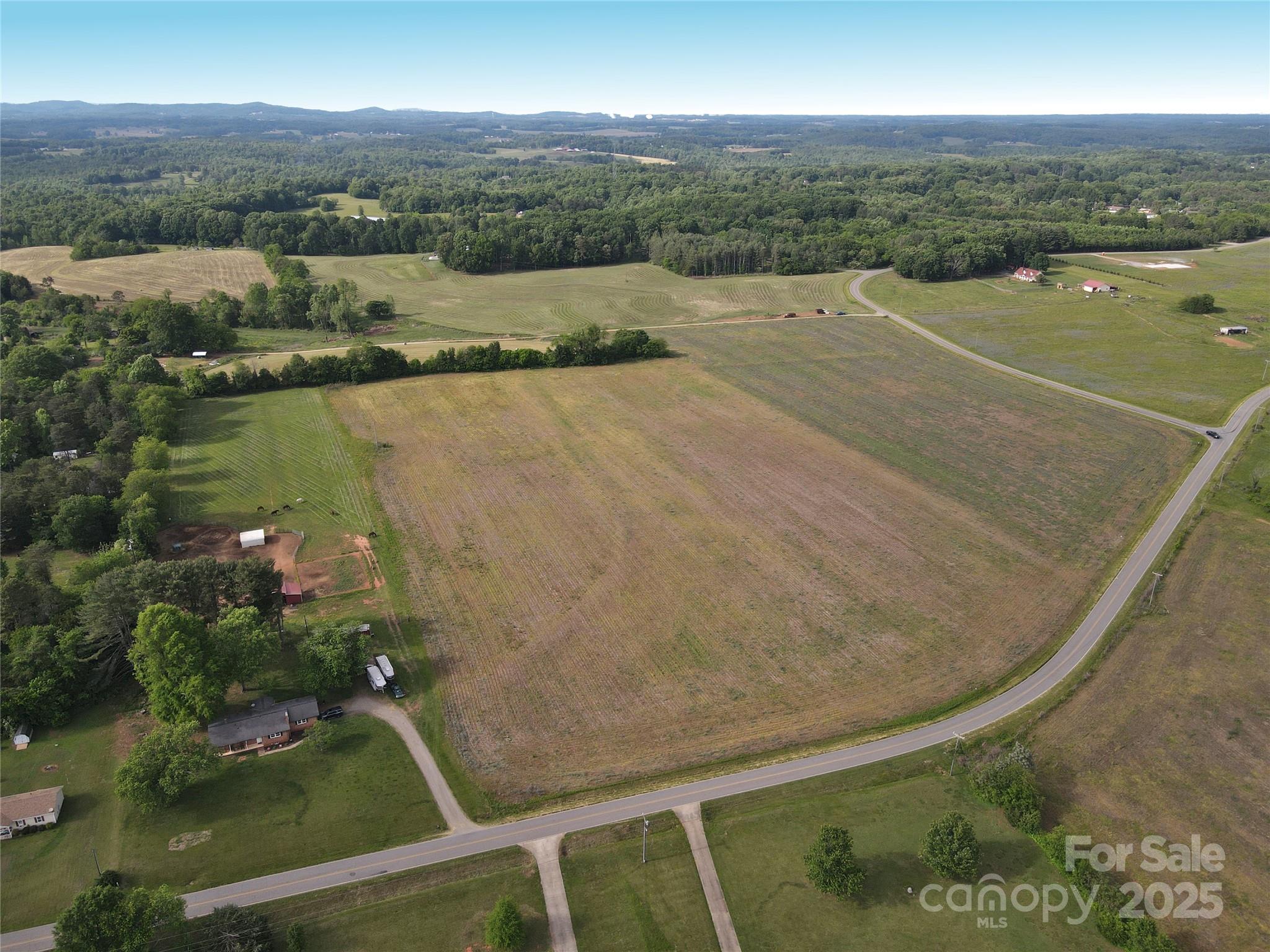 0 Trinity Road Statesville, NC 28625 - Photo 8 of 37 an aerial view of residential houses with outdoor space and river