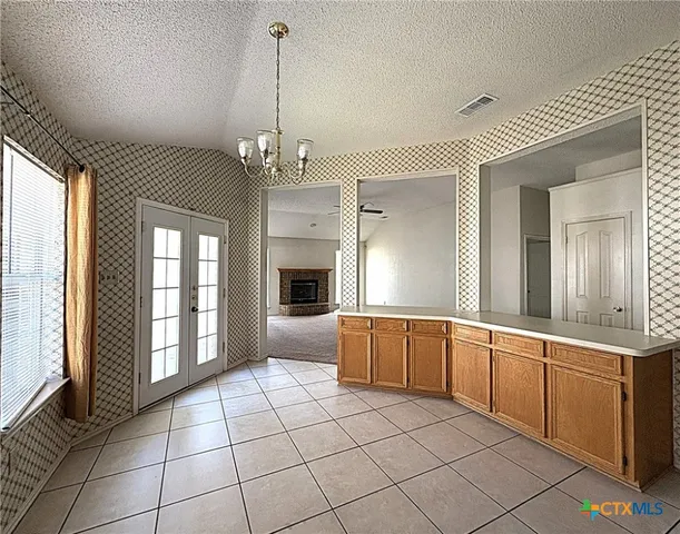 a very nice looking room with a chandelier