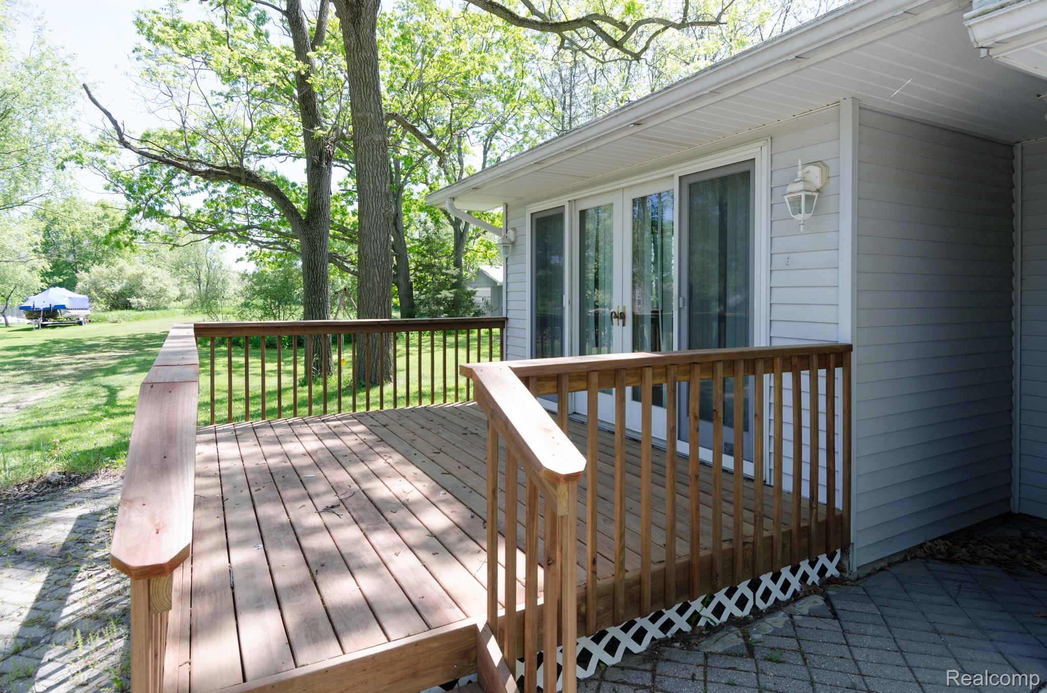13800 Lone Tree Road Milford, MI 48380 - Photo 15 of 77 East side view. New deck.