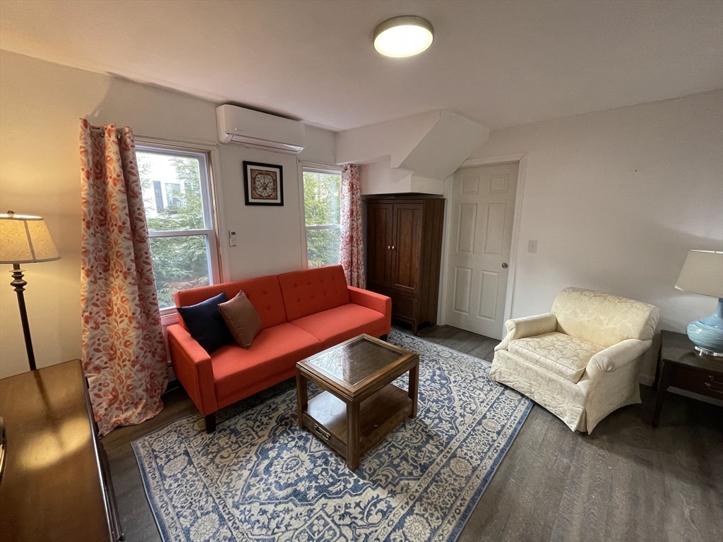 8 Pike Street Hopkinton, MA 01748 - Photo 9 of 34 a living room with furniture and a rug