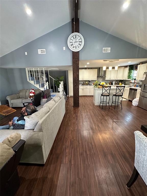 2839 Harts Bluff Road Mount Pleasant, TX 75455 - Photo 21 of 27 a living room with furniture and a chandelier