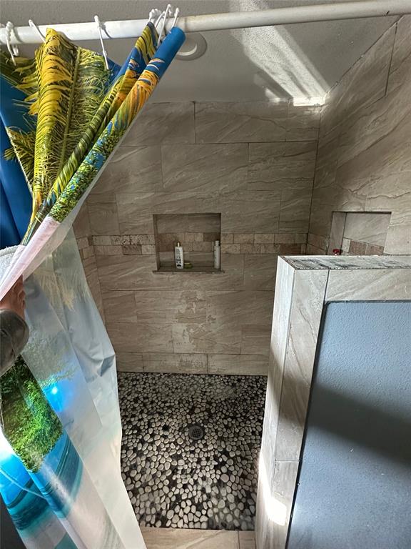 2839 Harts Bluff Road Mount Pleasant, TX 75455 - Photo 7 of 27 a bathroom with a sink and a mirror