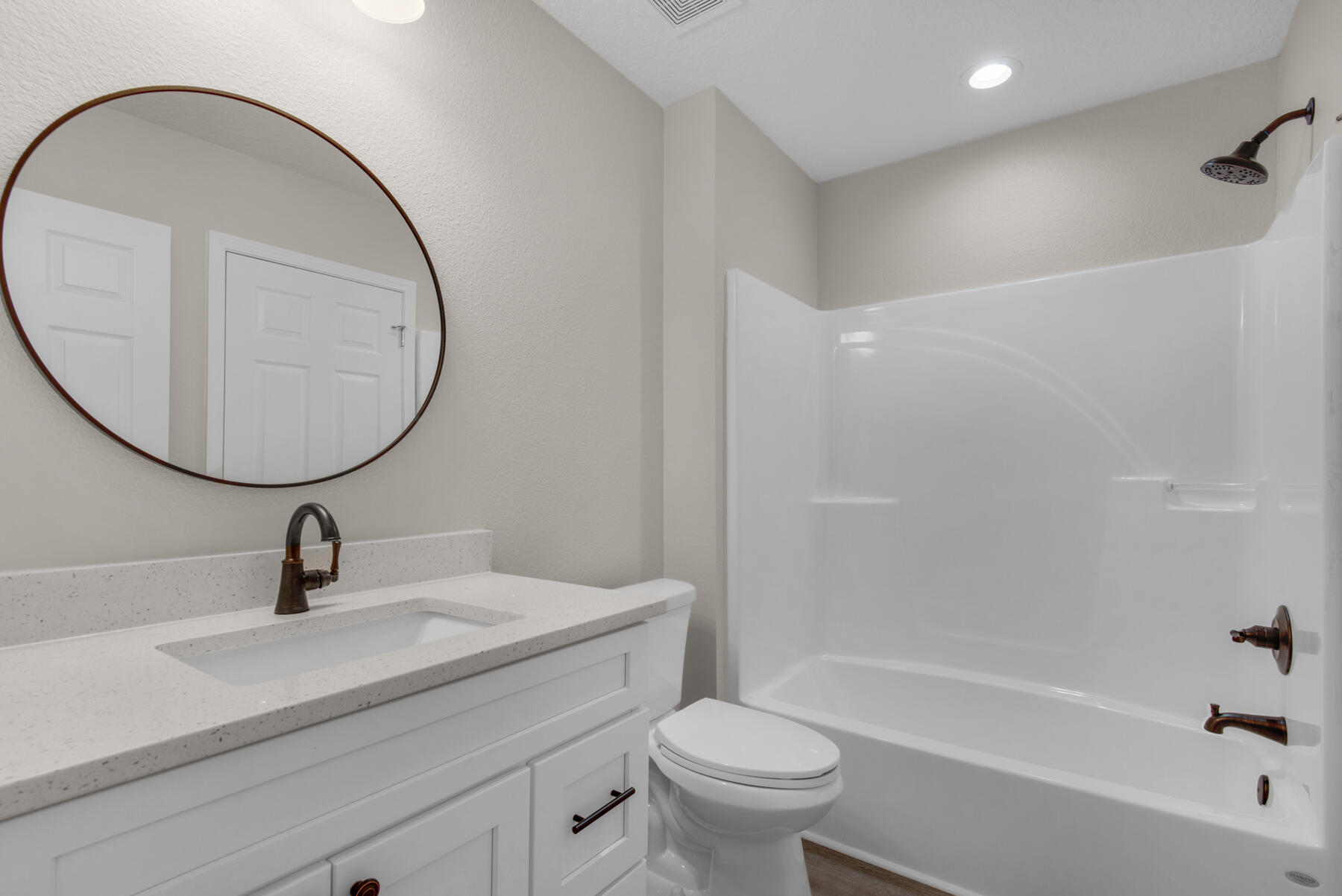 5438 Bayleaf Drive Crestview, FL 32539 - Photo 20 of 35 a bathroom with a sink a toilet and a mirror