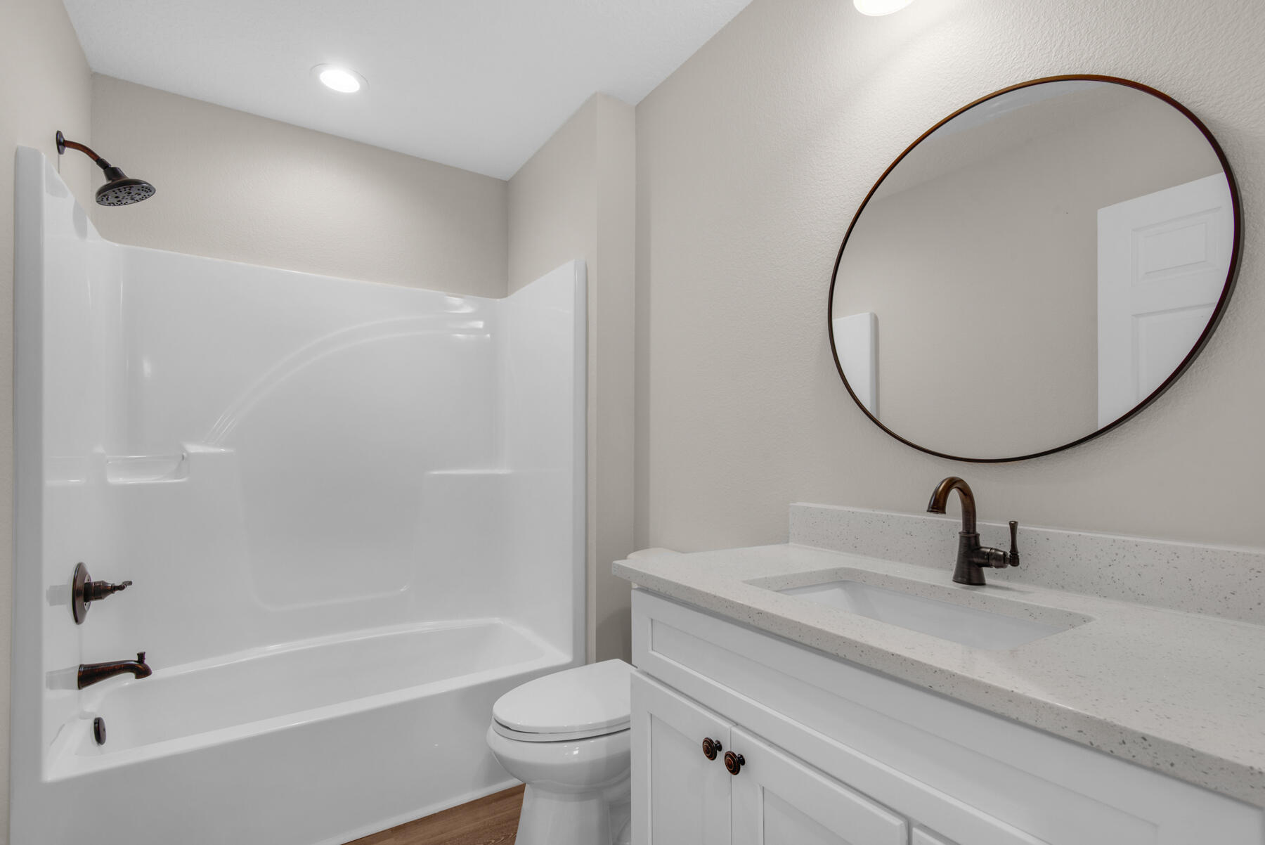 5438 Bayleaf Drive Crestview, FL 32539 - Photo 24 of 35 a bathroom with a sink a toilet and a mirror