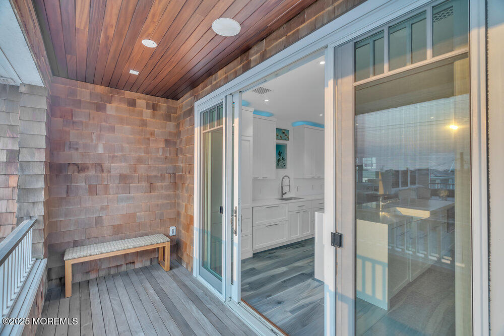 985 North Ocean Avenue Mantoloking, NJ 08738 - Photo 101 of 163 a bathroom with a glass door shower and a sink