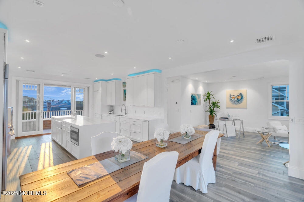 985 North Ocean Avenue Mantoloking, NJ 08738 - Photo 106 of 163 a view of a dining room with furniture and wooden floor