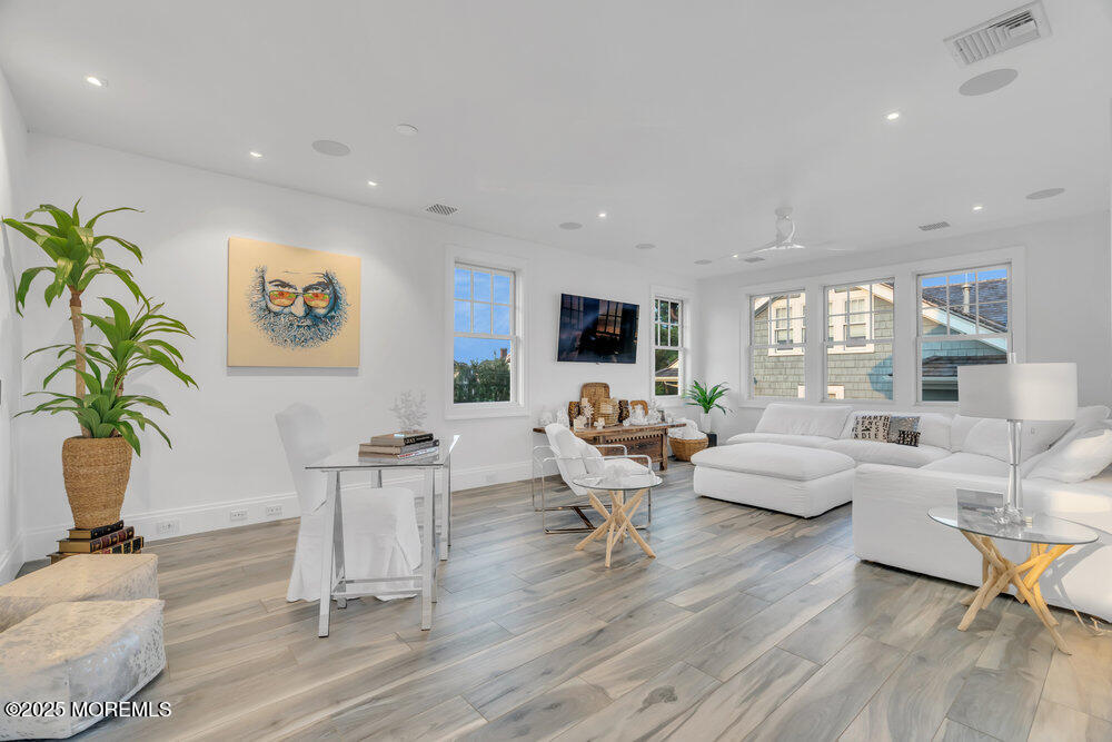 985 North Ocean Avenue Mantoloking, NJ 08738 - Photo 113 of 163 a living room with furniture or wooden floor and a potted plant
