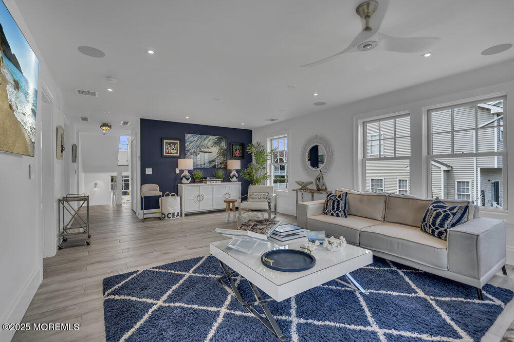 985 North Ocean Avenue Mantoloking, NJ 08738 - Photo 14 of 163 a living room with furniture and a large window