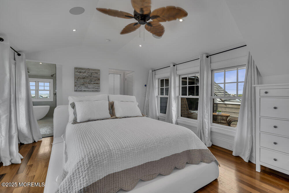 985 North Ocean Avenue Mantoloking, NJ 08738 - Photo 151 of 163 a bedroom with a large bed and a flat tv screen