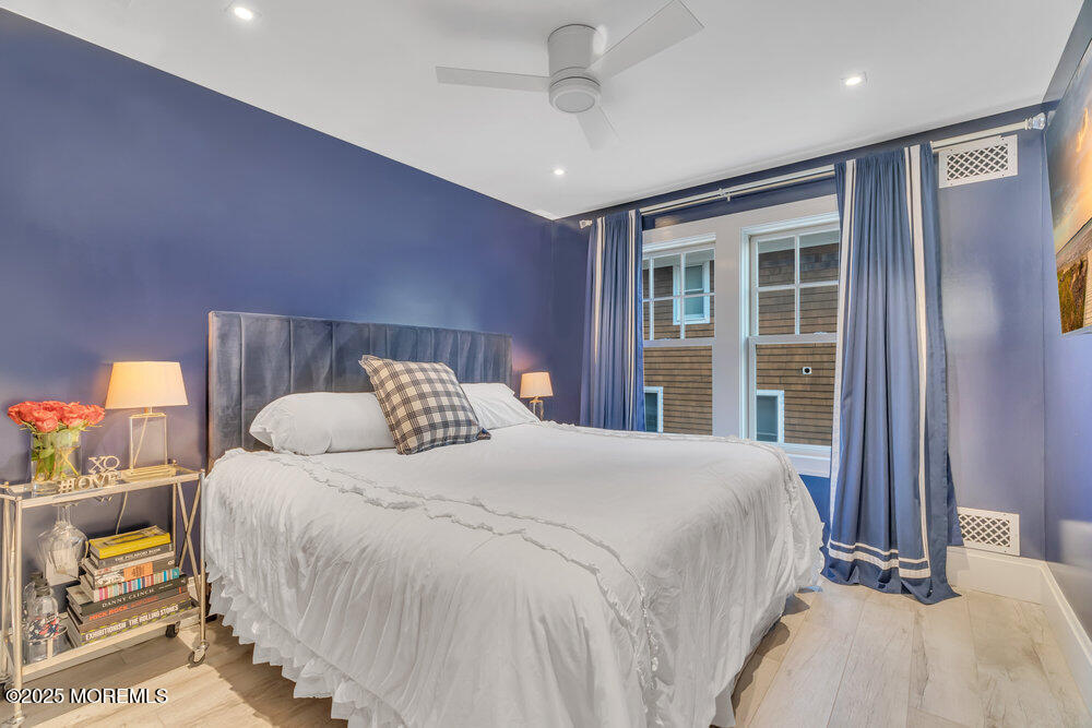 985 North Ocean Avenue Mantoloking, NJ 08738 - Photo 16 of 163 a bedroom with a large bed and a window