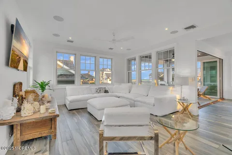 a white bath tub sitting next to a white sink