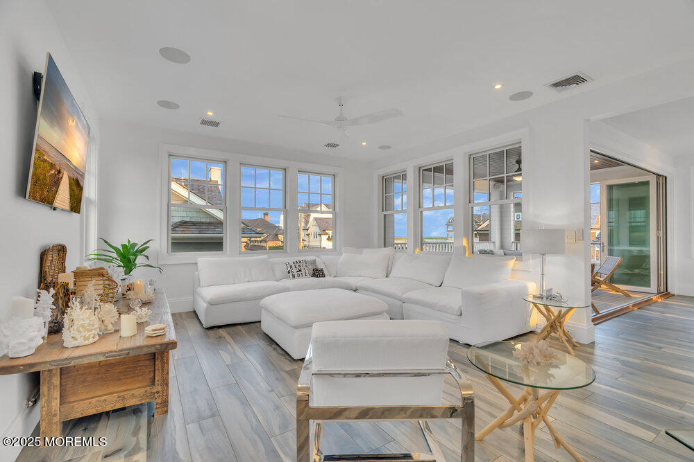 985 North Ocean Avenue Mantoloking, NJ 08738 - Photo 21 of 163 a living room with furniture or couch and a wooden floor