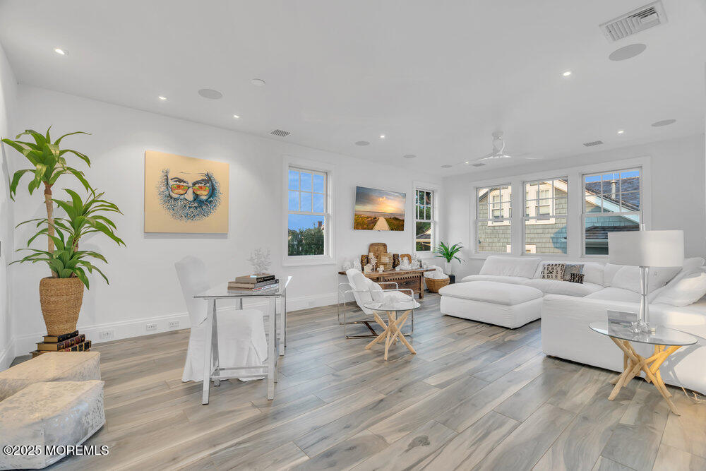 985 North Ocean Avenue Mantoloking, NJ 08738 - Photo 22 of 163 a living room with furniture or wooden floor and a potted plant
