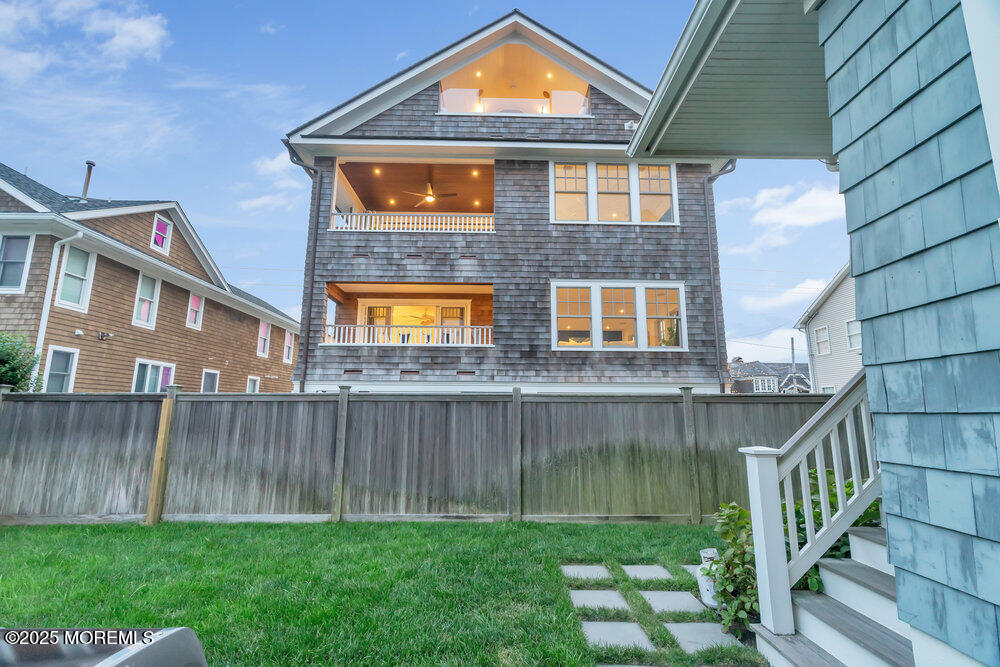 985 North Ocean Avenue Mantoloking, NJ 08738 - Photo 27 of 163 a front view of a house with a yard