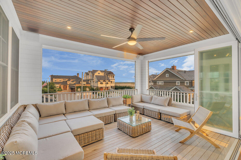 985 North Ocean Avenue Mantoloking, NJ 08738 - Photo 3 of 163 a living room with furniture and a rug