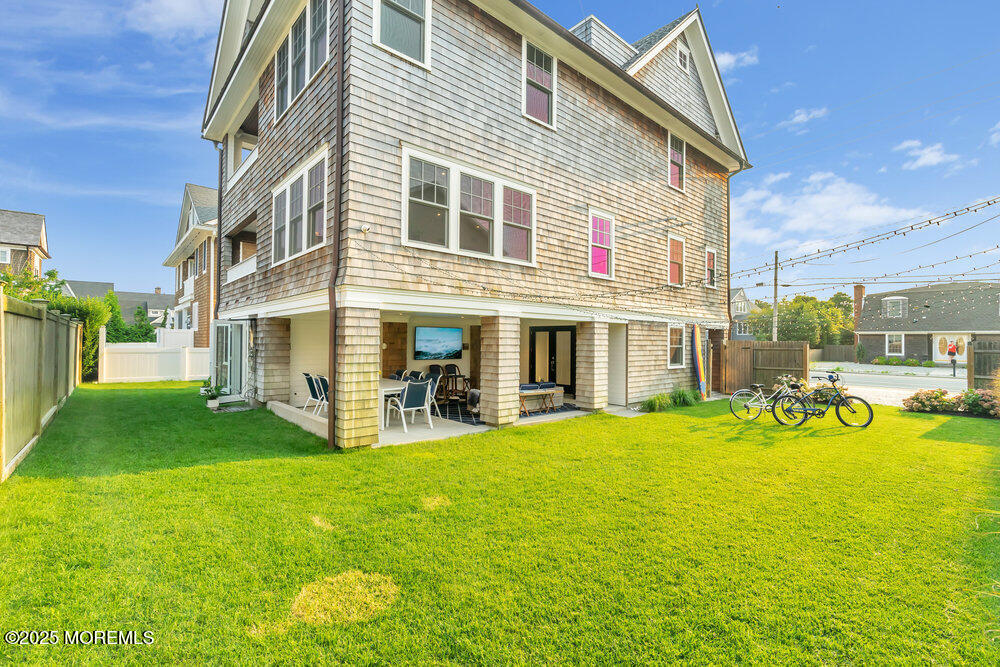 985 North Ocean Avenue Mantoloking, NJ 08738 - Photo 35 of 163 a view of a house with a yard patio and swimming pool