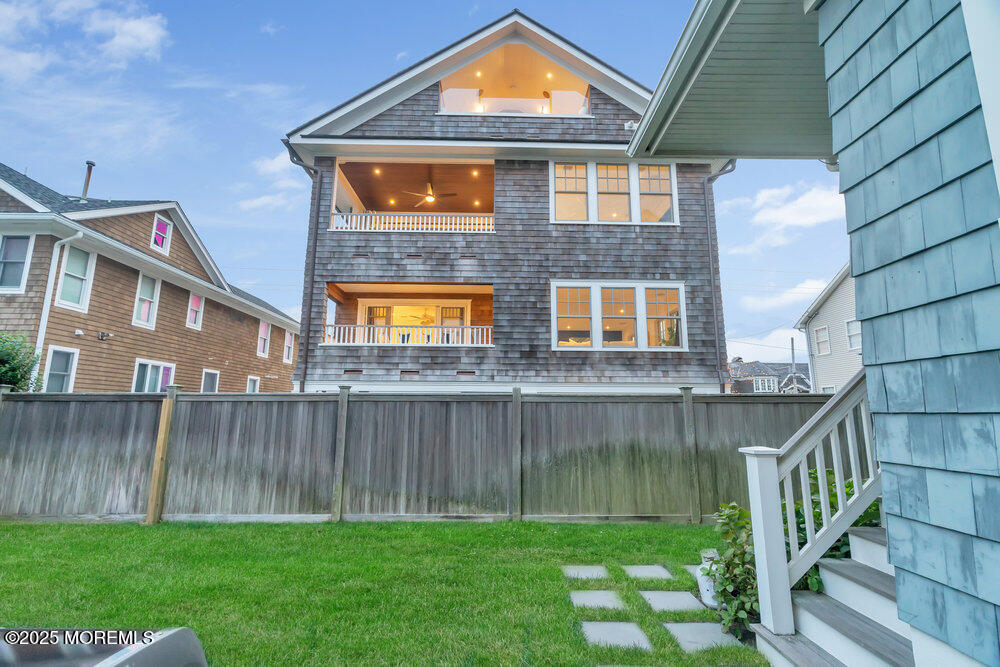 985 North Ocean Avenue Mantoloking, NJ 08738 - Photo 43 of 163 a front view of a house with a yard