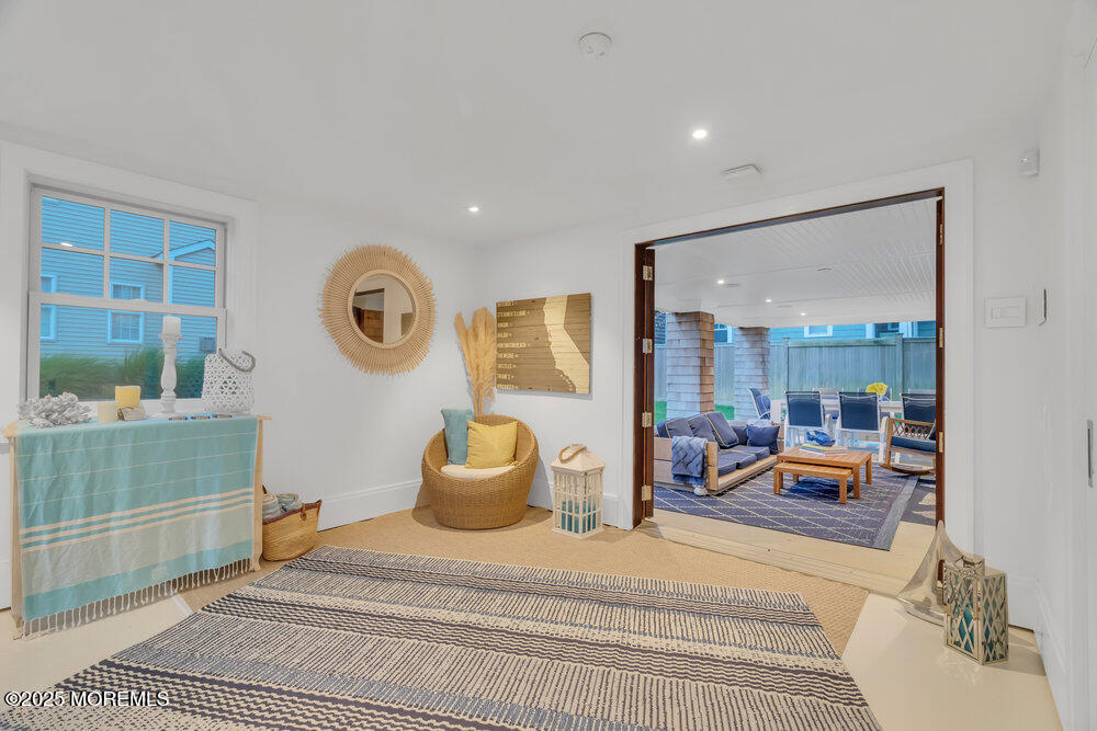 985 North Ocean Avenue Mantoloking, NJ 08738 - Photo 50 of 163 a bedroom with furniture and a large window