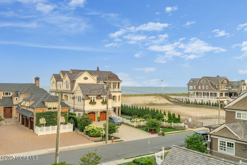 985 North Ocean Avenue Mantoloking, NJ 08738 - Photo 80 of 163 a view of a city with lawn chairs