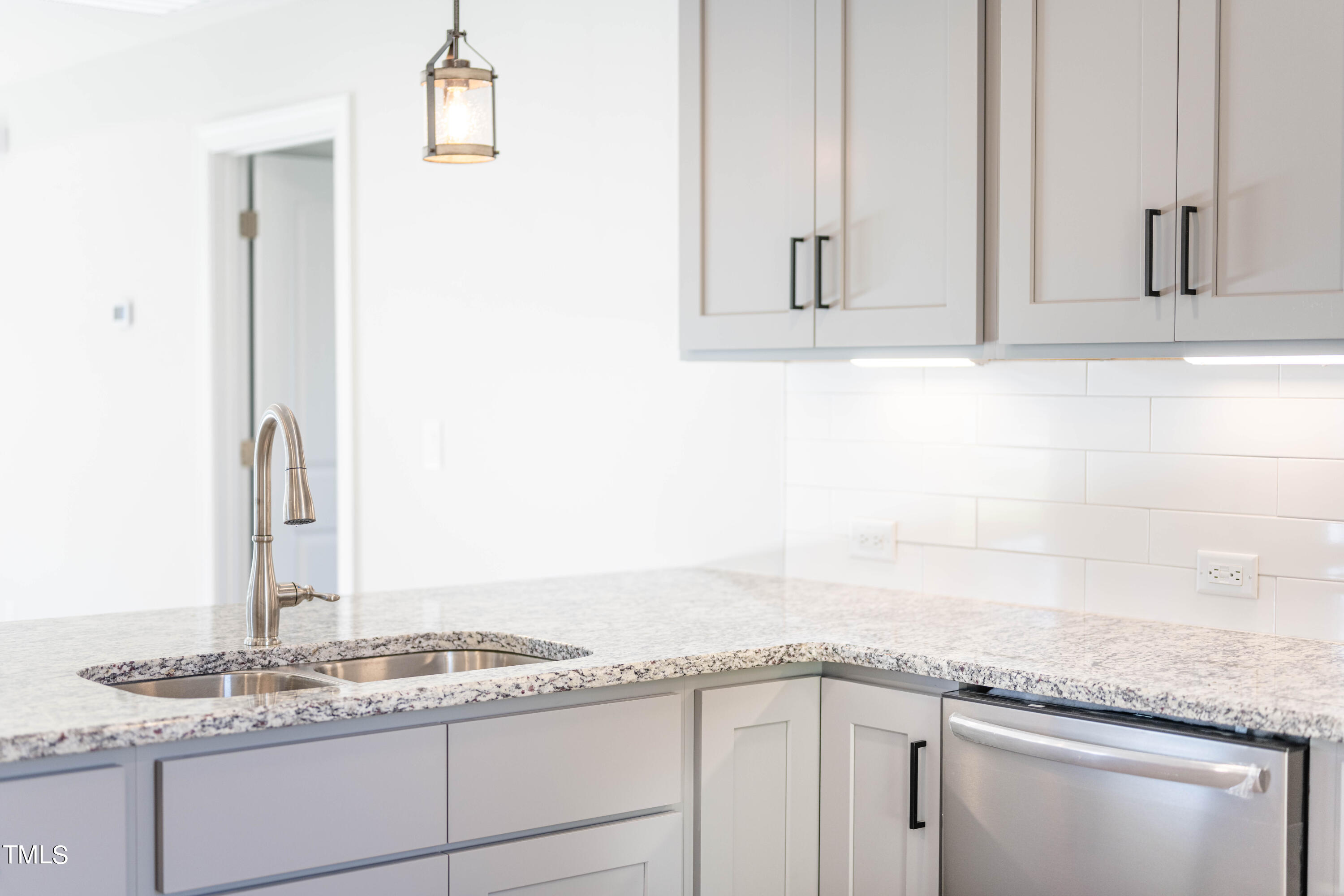120 Jupiter Drive Dunn, NC 28334 - Photo 23 of 40 a bathroom with a granite countertop sink and a mirror