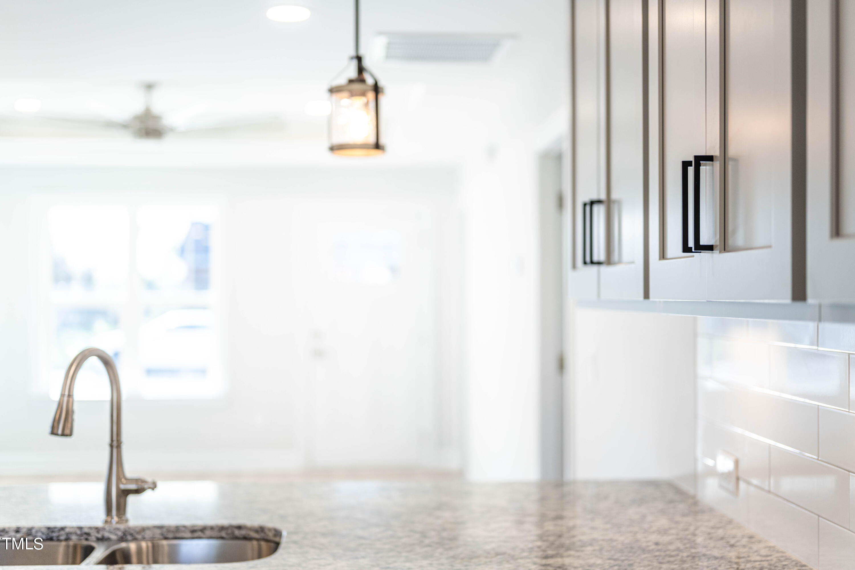 120 Jupiter Drive Dunn, NC 28334 - Photo 27 of 40 a close view of a sink a faucet and a window in the kitchen