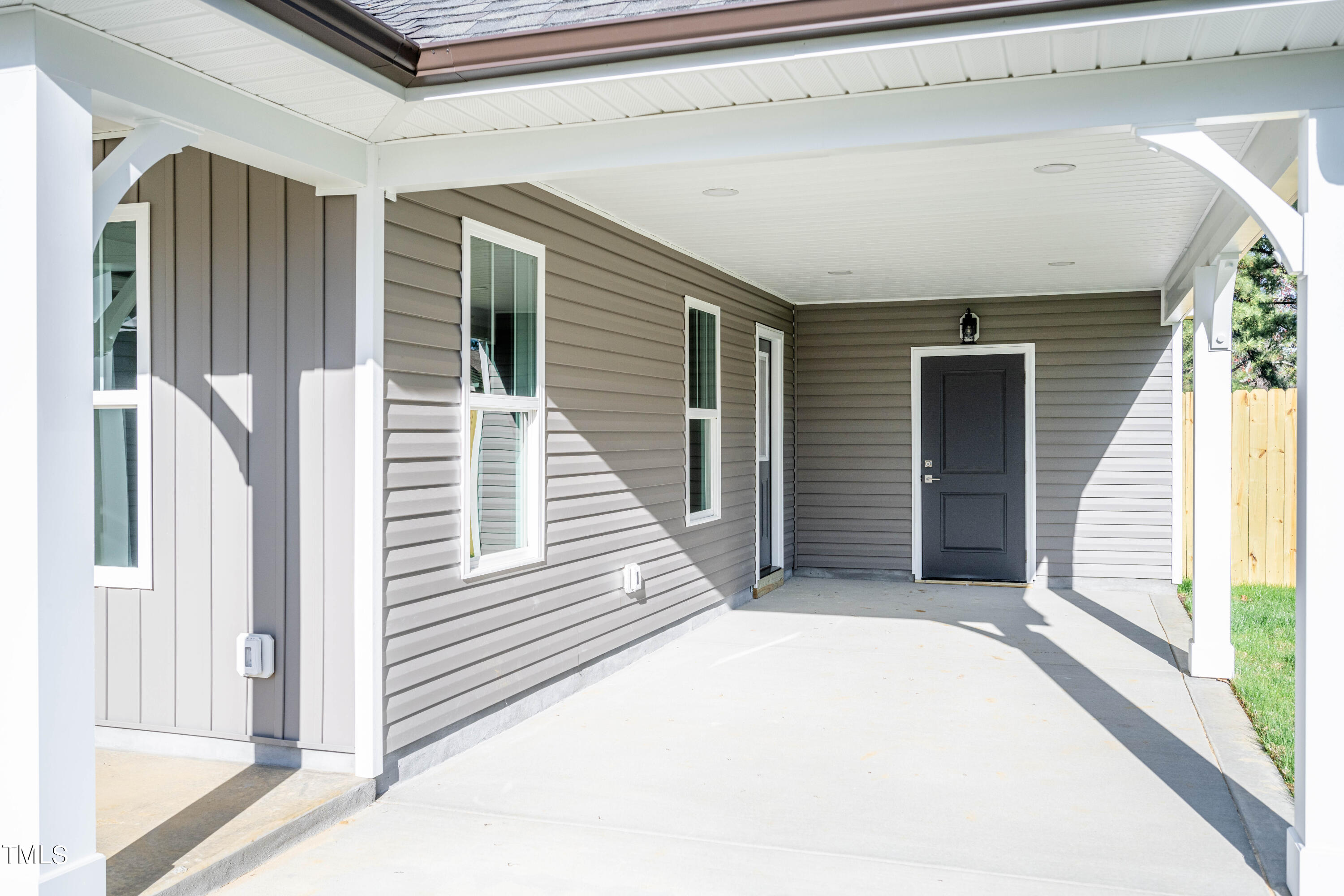 120 Jupiter Drive Dunn, NC 28334 - Photo 3 of 40 a view of a house with stairs and a large window