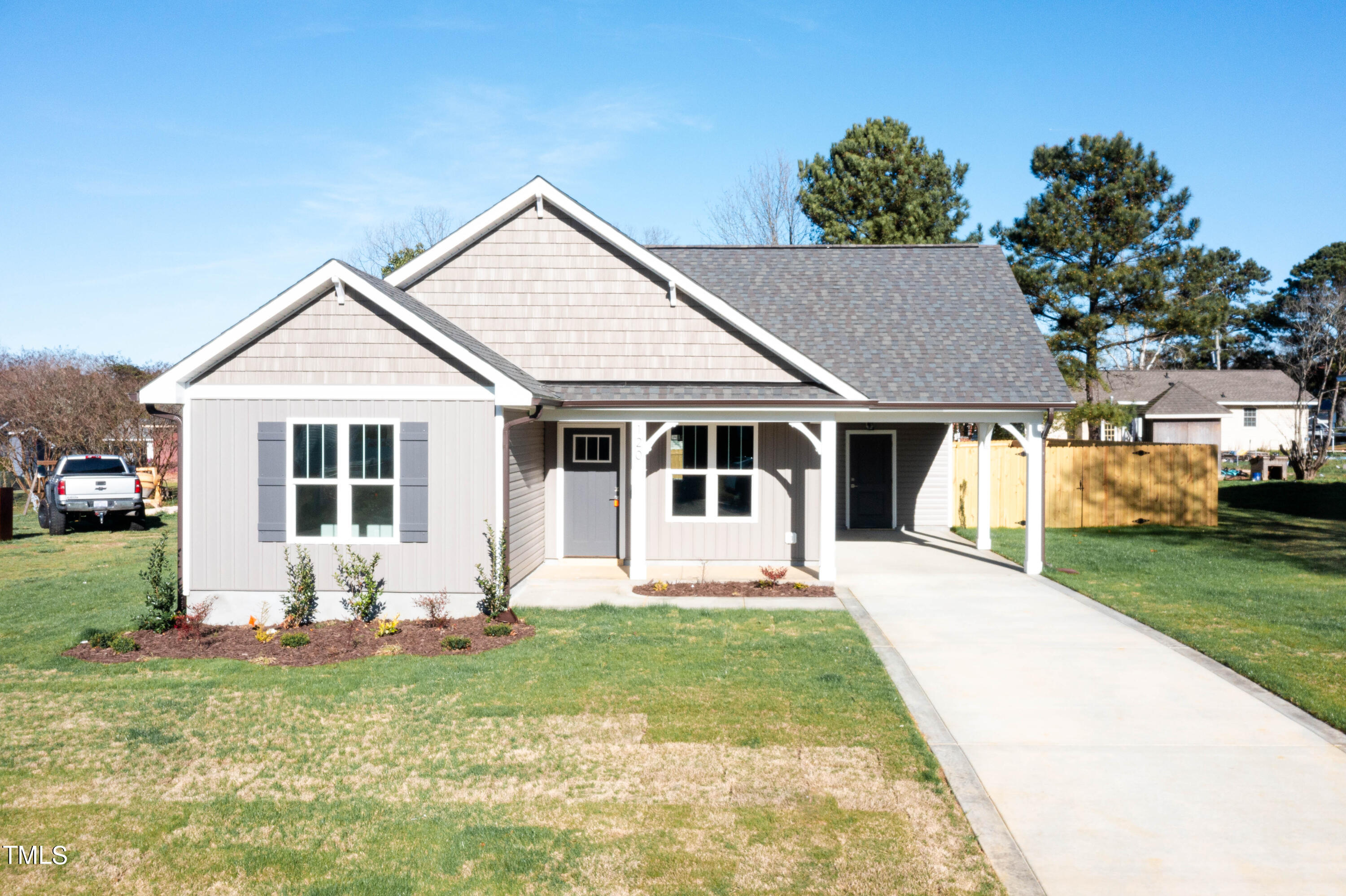 120 Jupiter Drive Dunn, NC 28334 - Photo 34 of 40 a front view of house with yard and green space