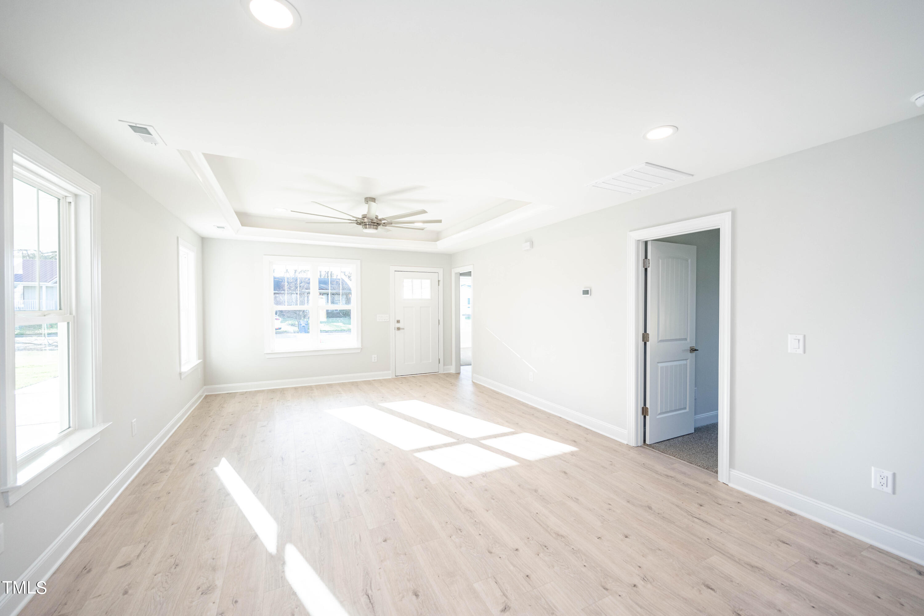 120 Jupiter Drive Dunn, NC 28334 - Photo 9 of 40 a view of an empty room with a window