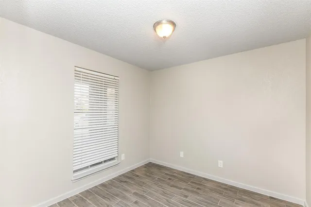 a view of a room that has a window in it