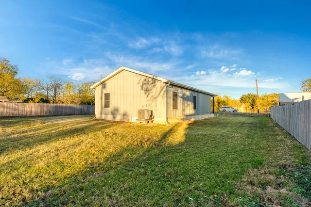 a view of a house with a swimming pool