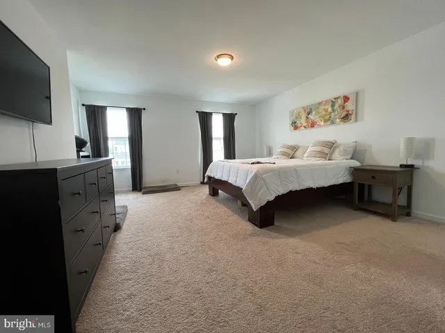 a bathroom with a sink a vanity and a mirror