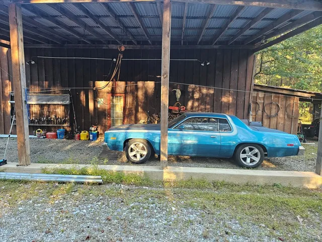 a car parked in front of a house