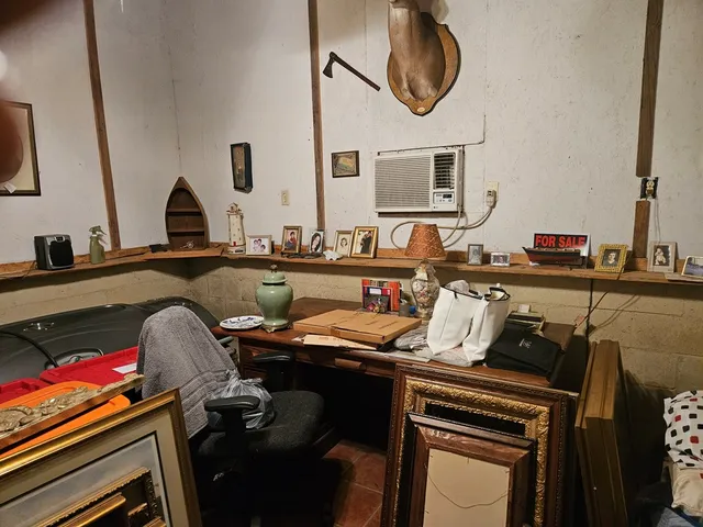 a bathroom with a sink vanity mirror and toilet