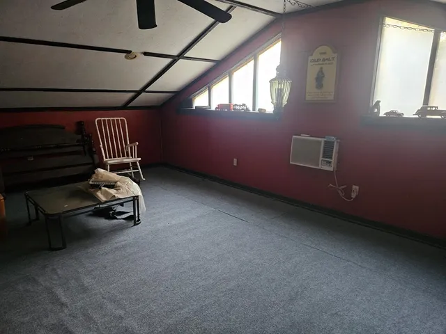 a stove top oven sitting inside of a kitchen